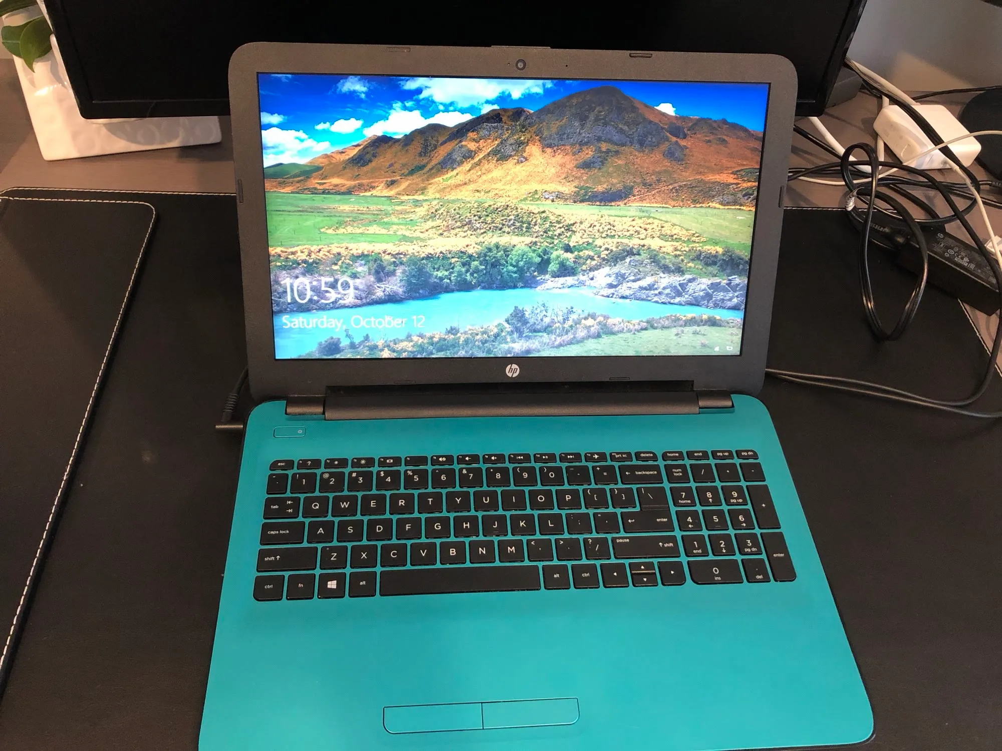 A laptop with a freshly replaced screen, powered on and tested at JY Computer Services